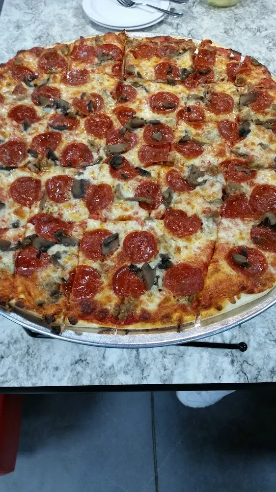 Pepperoni Italian Sausage and Mushroom Pizza